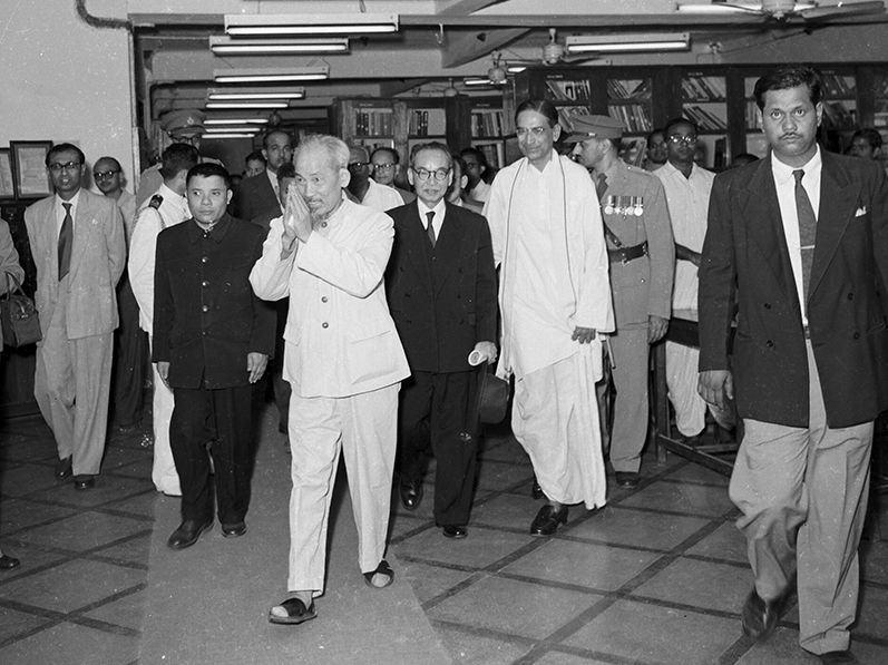 Ho Chi-minh acknowledging ovation by Institute workers during his visit to ISI on February 13, 1958